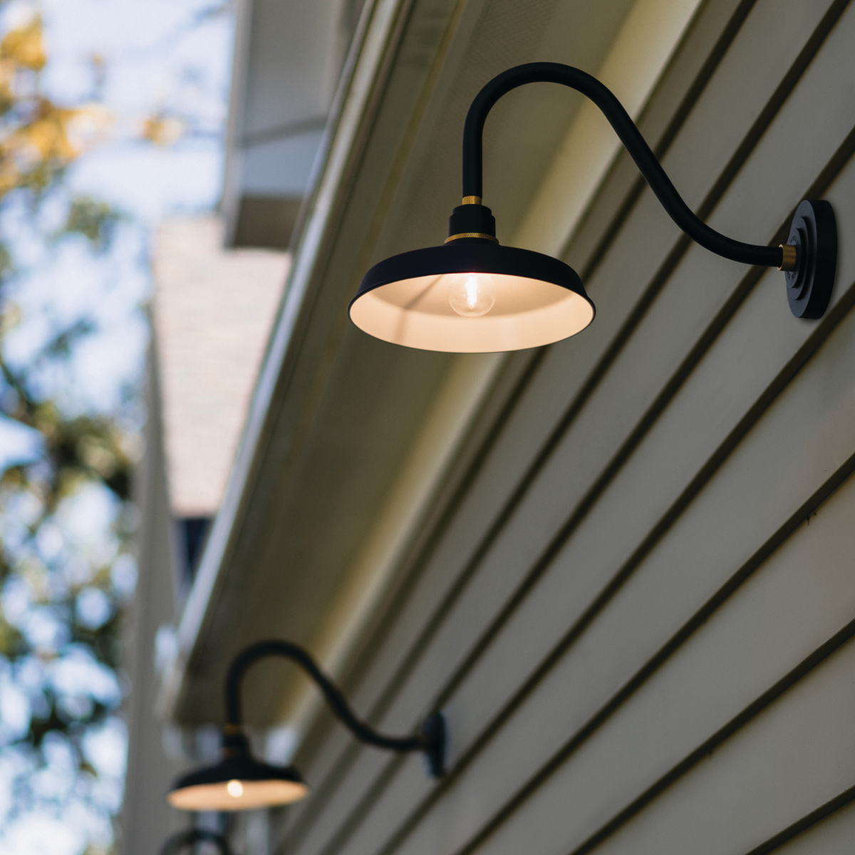 An outdoor wall sconce providing light and security.