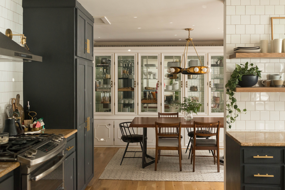 Hopper Chandelier by Martyn Lawrence Bullard above a dining table.